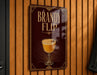 A sign for "Bandy Flip" cocktail, featuring an illustration of a cocktail glass with a garnish.