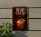A sign for "Bandy Smash" cocktail is displayed on a wall, featuring an illustration of a cocktail glass with a garnish.