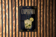 a sign for a Caipirinha cocktail, which is a type of tropical drink made with rum, lime, sugar, and ice.