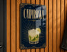 A sign for a cocktail called "Caipiroski" is displayed on a wooden wall.