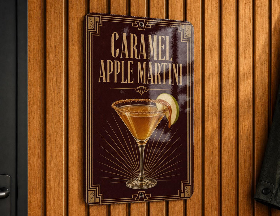 A sign for a caramel apple martini is displayed on a wooden wall.