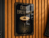 A sign for a coconut espresso martini, featuring an illustration of a martini glass with a frothy head and coffee beans.