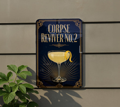 a sign with a cocktail glass and a lemon on a wall.