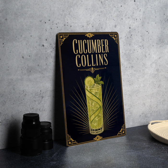 a decorative sign for a cucumber Collins cocktail, with a glass illustration and text.