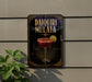 a decorative sign with the text "DAIQUIR MULATA" and an illustration of a cocktail glass with a lemon slice.