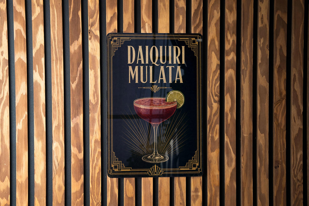 A decorative sign for a Daiquiri Mulata cocktail is displayed on a wooden wall.
