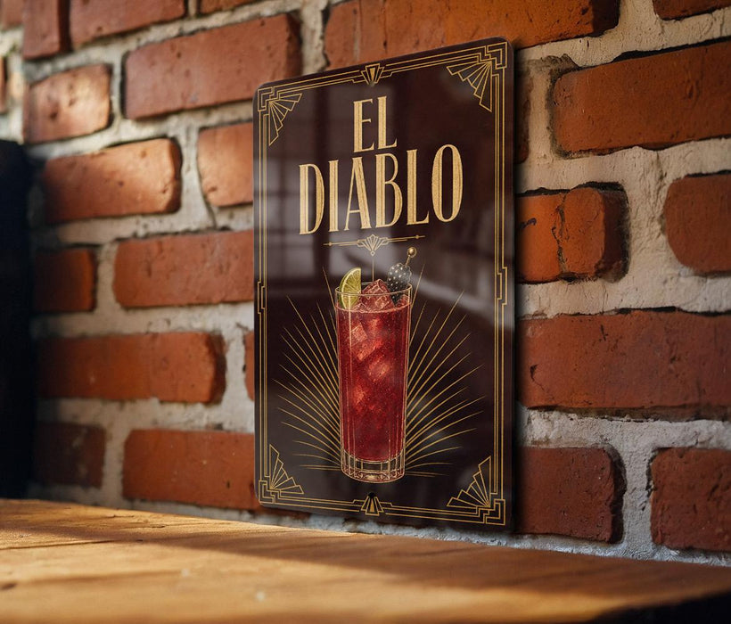 a sign for "El Diablo", which is a cocktail, hanging on a brick wall.