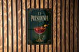 a sign with the title "EL PRESIDENTE" and an illustration of a cocktail glass with a lemon twist.