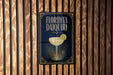A sign for "Florida Daiquiri" is displayed on a wooden wall.