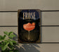 a sign for a drink called "FROSE" with a glass of pink drink and a strawberry garnish.