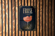 A poster with the word "FROSE" prominently displayed, featuring a glass of pink cocktail with a strawberry garnish.