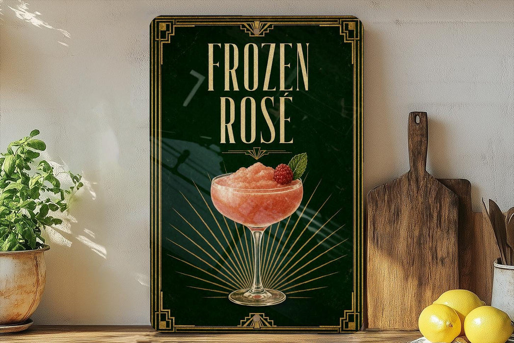 A framed poster advertising a "FROZEN ROSE" cocktail, featuring a glass of pink drink with a strawberry garnish.