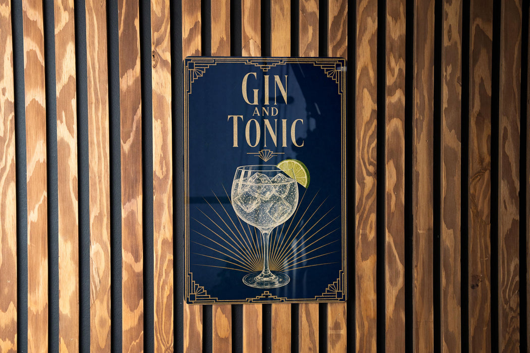 A sign with the text "GIN AND TONIC" and an illustration of a gin and tonic glass, placed on a wooden wall.