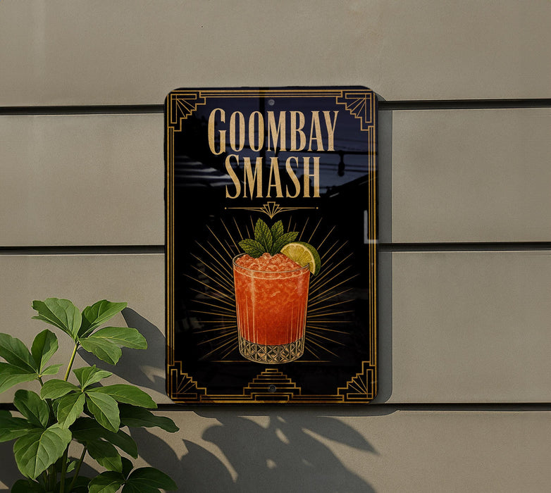 A sign for Goombay Smash cocktail is displayed on a wall, featuring an illustration of a cocktail with a lemon slice and a mint leaf.