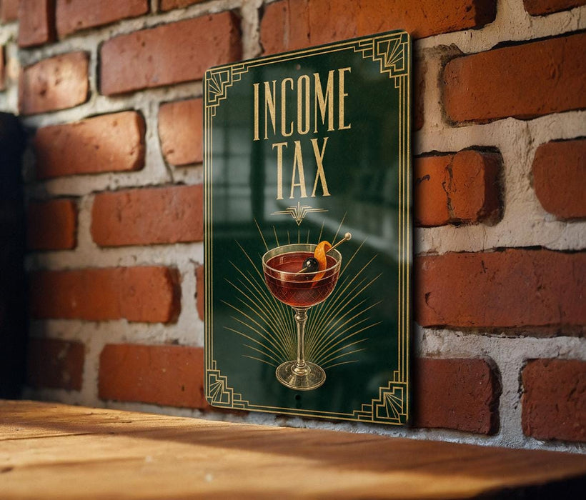 A sign on a brick wall that reads "INCOME TAX" with an illustration of a martini glass containing an orange peel.
