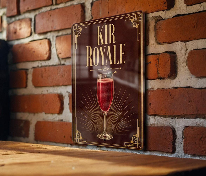 a sign with the text "KIR ROYALE" and an illustration of a glass of red wine.