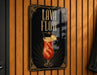 A sign that reads "Lava Flow" with an illustration of a red drink in a glass.