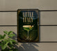 a sign that reads "Little Italy" with a picture of a cocktail on it.