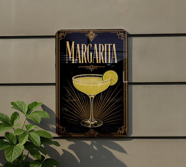 A sign for Margarita, featuring a glass of Margarita cocktail with a lime slice, is displayed on a wall.