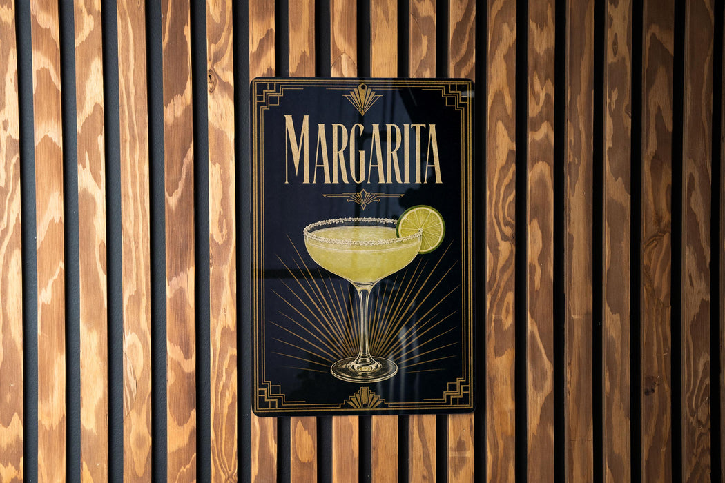 A sign for Margarita cocktail is displayed on a wooden wall.
