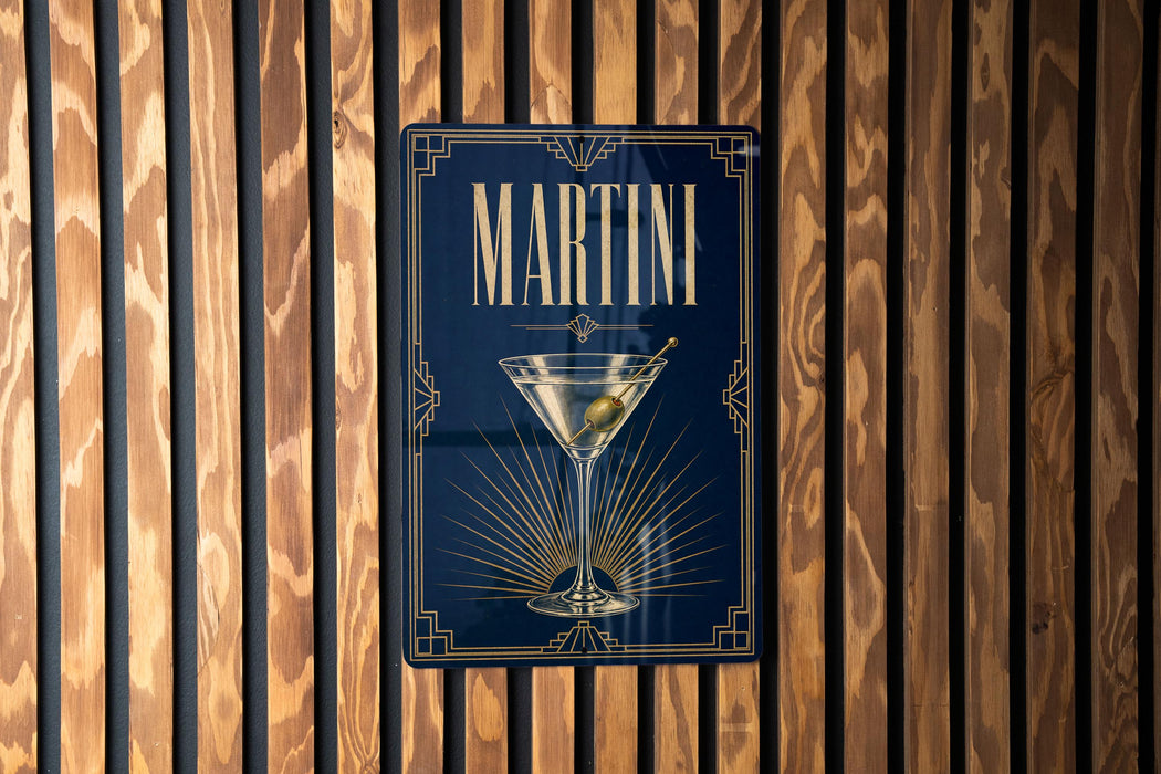 A sign with the word "MARTINI" prominently displayed, featuring an illustration of a martini glass with a green olive.