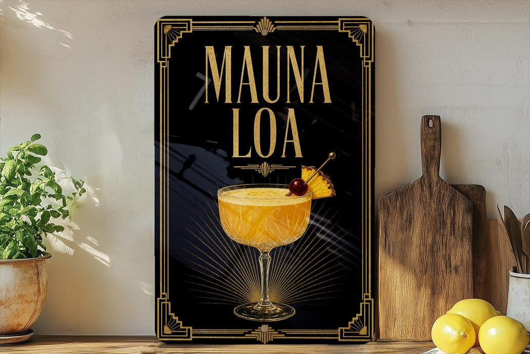 a framed advertisement for a drink called "Mauna Loa", which is a cocktail. The advertisement displays a glass of the drink with a pineapple garnish and a cherry, along with the text "MAUNA LOA" prominently displayed.