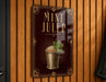 A sign for "Mint Julep" is displayed on a wooden wall, featuring an illustration of a mint julep cocktail in a silver cup.