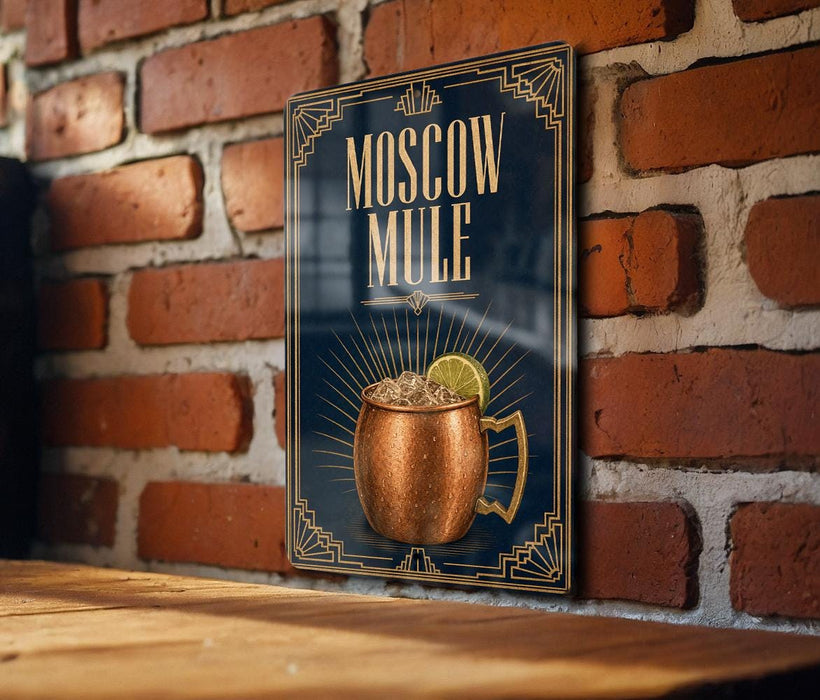 A poster or sign for a Moscow Mule cocktail, featuring an illustration of a copper mug with a lemon slice.