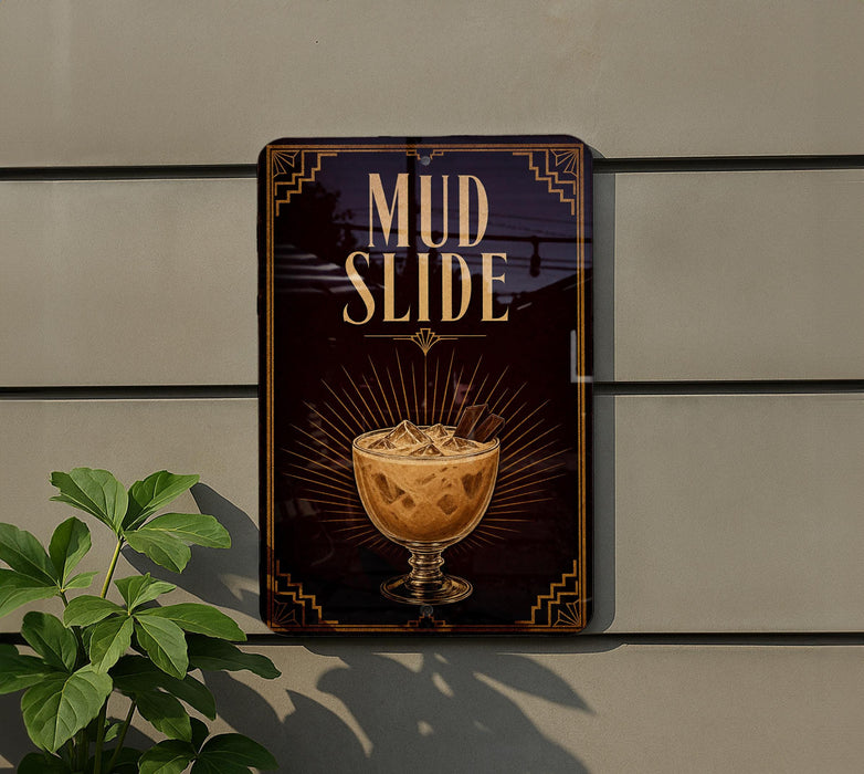 a sign that reads "MUD SLIDE" with an illustration of a glass containing a beverage, possibly a cocktail or a milkshake, on it.