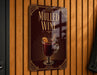 A sign advertising "Mulled Wine" is displayed on a wooden wall.