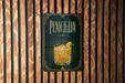 A sign for "Penicillin" cocktail is displayed on a wooden wall.