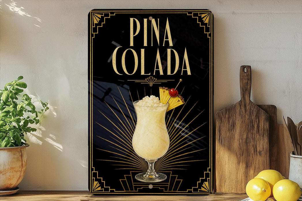 A decorative sign for a Pina Colada cocktail, featuring a glass of the drink and a pineapple garnish, is displayed on a wooden shelf next to a potted plant and a cutting board.