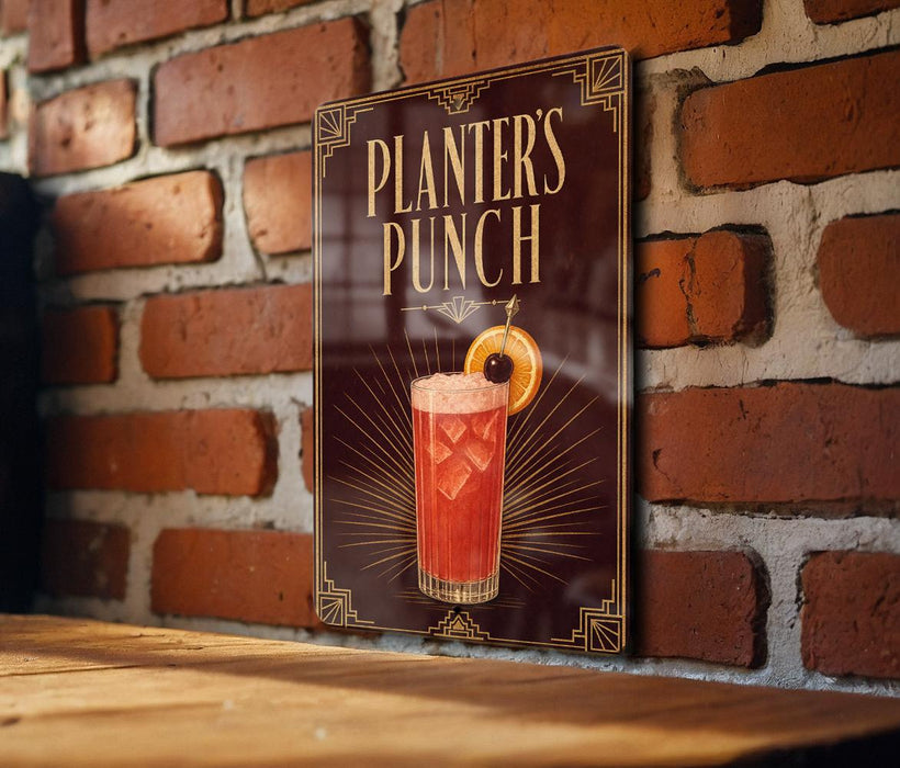 A sign for "Planters Punch" is displayed on a brick wall, featuring an illustration of a cocktail with a cherry on top.