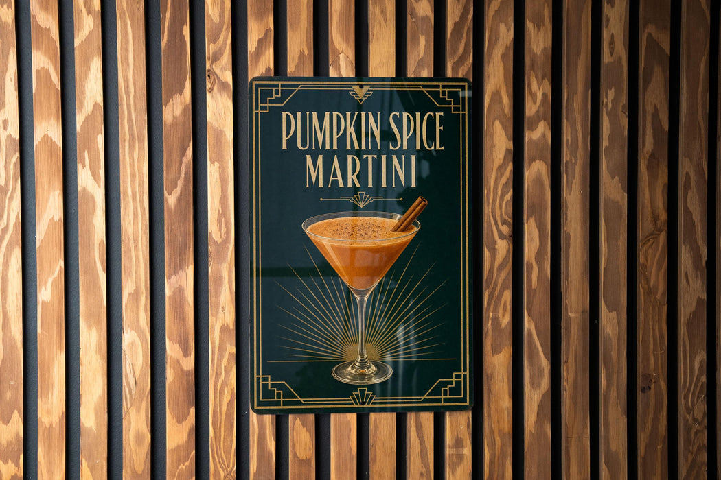 A sign for a pumpkin spice martini is displayed on a wooden wall.