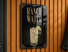 A sign for "Ranch Water" is displayed on a wooden wall, featuring an illustration of a glass of ranch water with a lime slice.
