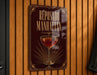 A sign that reads "Reposado Manhattan" with an illustration of a glass of Manhattan cocktail.
