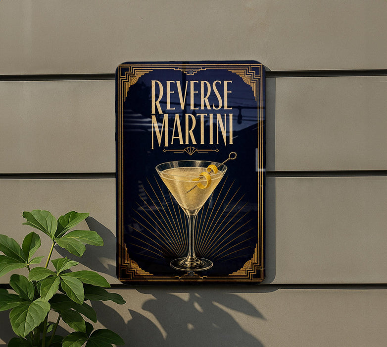 a sign for "Reverse Martini" with a martini glass and lemon on a wall.