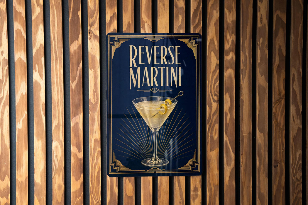 A poster with the text "REVERSE MARTINI" and an illustration of a martini glass with a lemon twist.