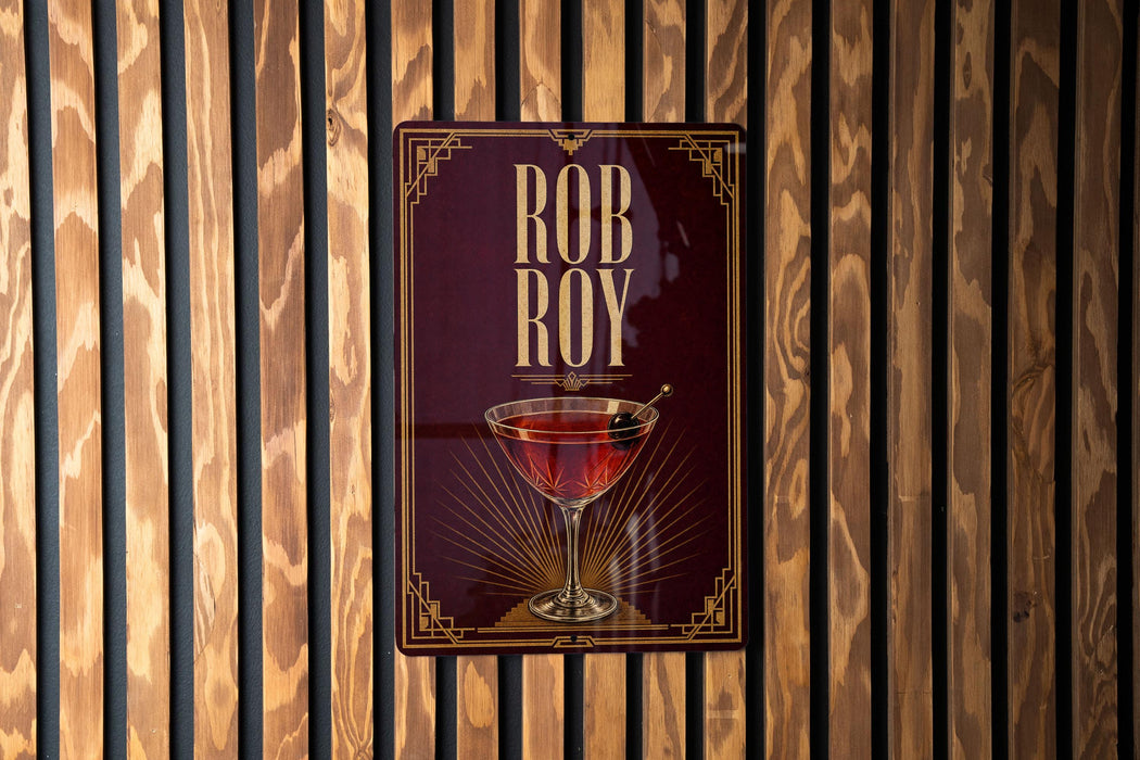 A poster with the name "ROB ROY" displayed prominently, along with an illustration of a martini glass.