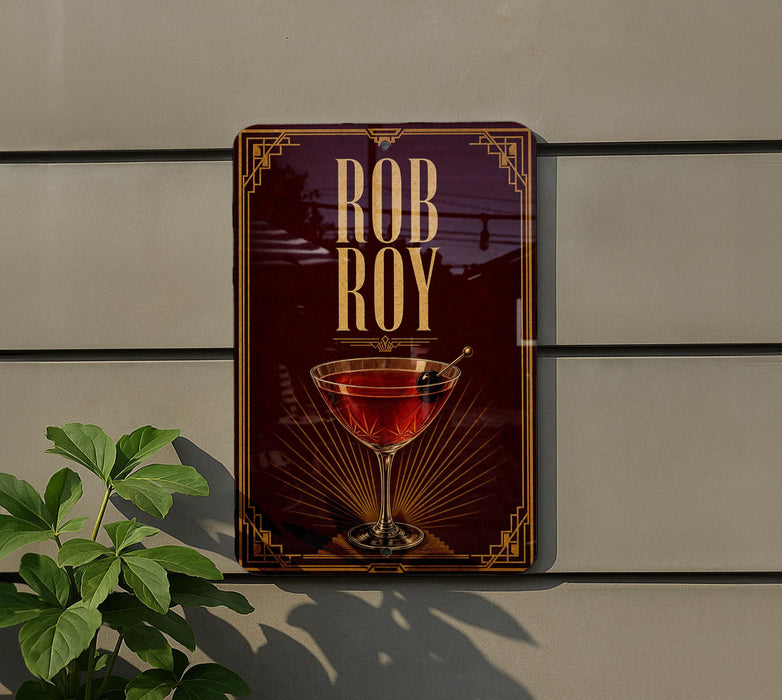 a sign for Rob Roy cocktails, with a glass of red cocktail prominently displayed.