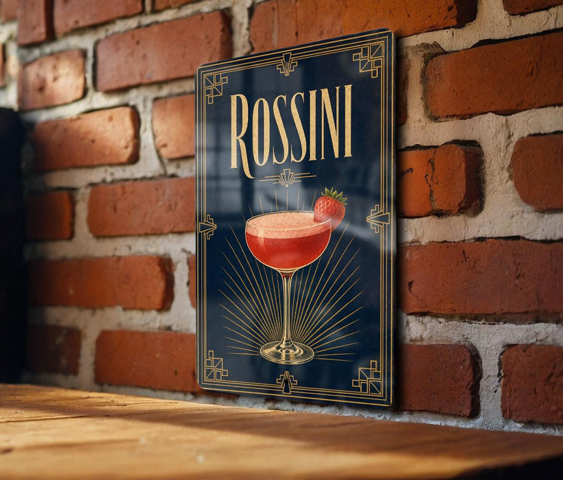 A framed poster of a cocktail called "Rossini" is displayed on a brick wall.