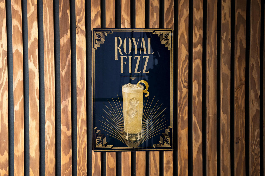 A poster advertising "Royal Fizz" is displayed on a wooden wall.