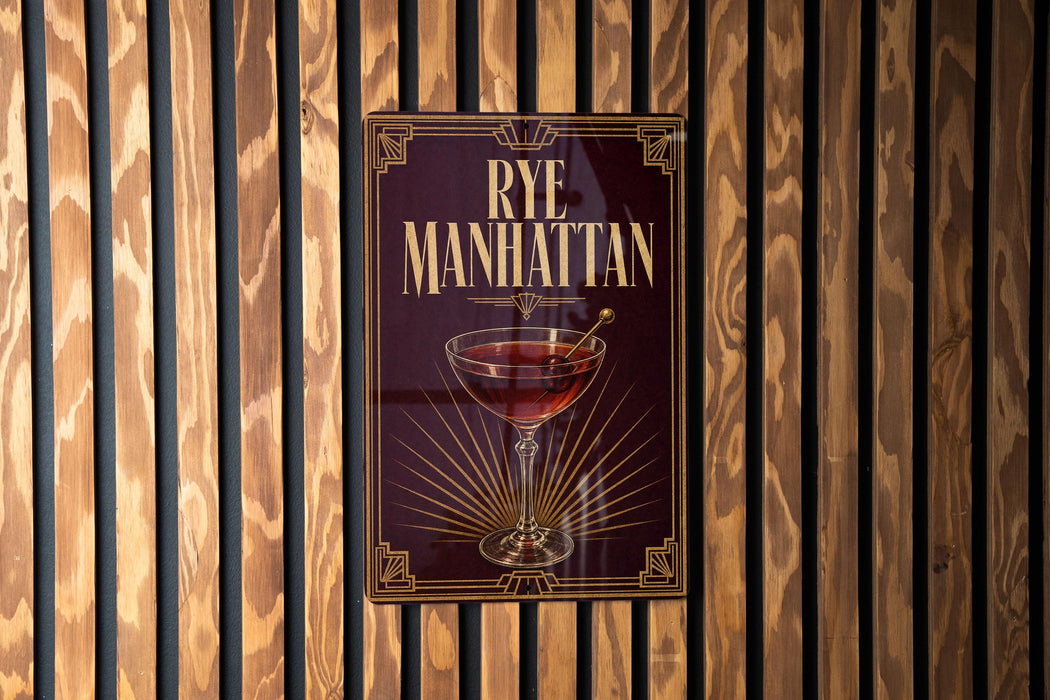 A poster for "Rye Manhattan" cocktail, featuring a glass of the drink and decorative elements.