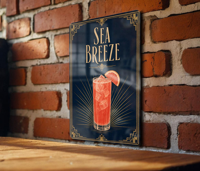 a sign with the text "SEA Breeze" and an illustration of a cocktail with a slice of lemon.