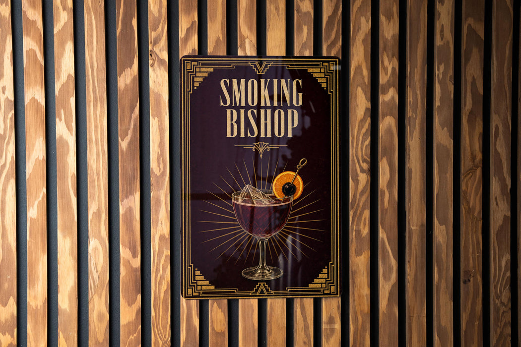 A poster for a "Smoking Bishop" establishment, featuring an illustration of a glass containing a drink and garnish.