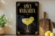 a decorative sign with the text "SPICY MARGARITA" and an illustration of a margarita glass with a lime slice.