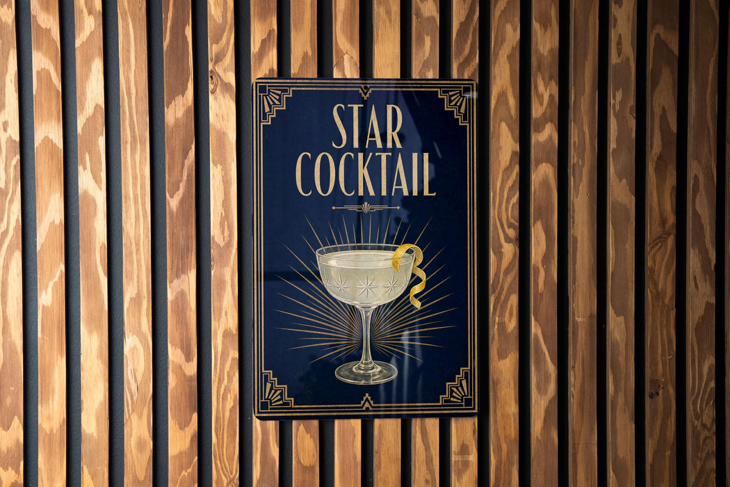 a poster advertising a "Star Cocktail" with a glass illustration and a lemon twist.