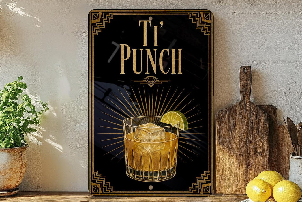 A decorative sign with the text "T'PUNCH" and an illustration of a cocktail glass with ice and a lime wedge.