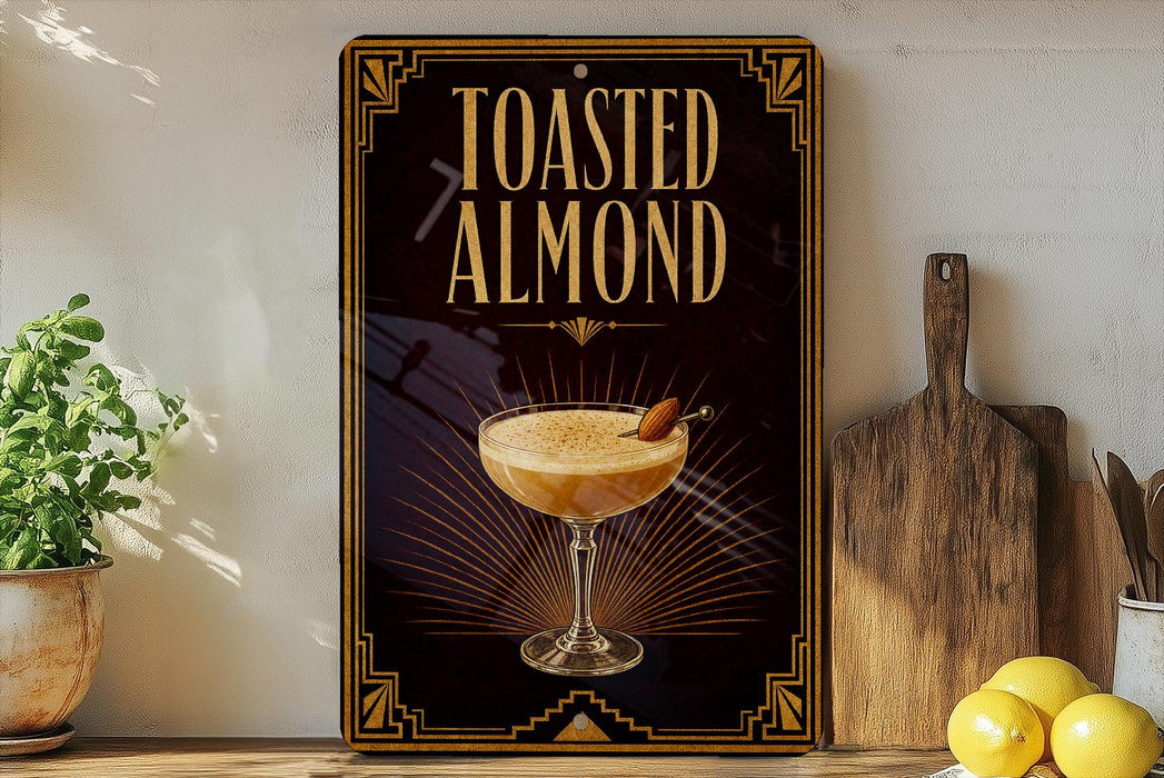 A sign for "Toasted Almond" cocktail, featuring an illustration of a cocktail glass with a toasted almond garnish.