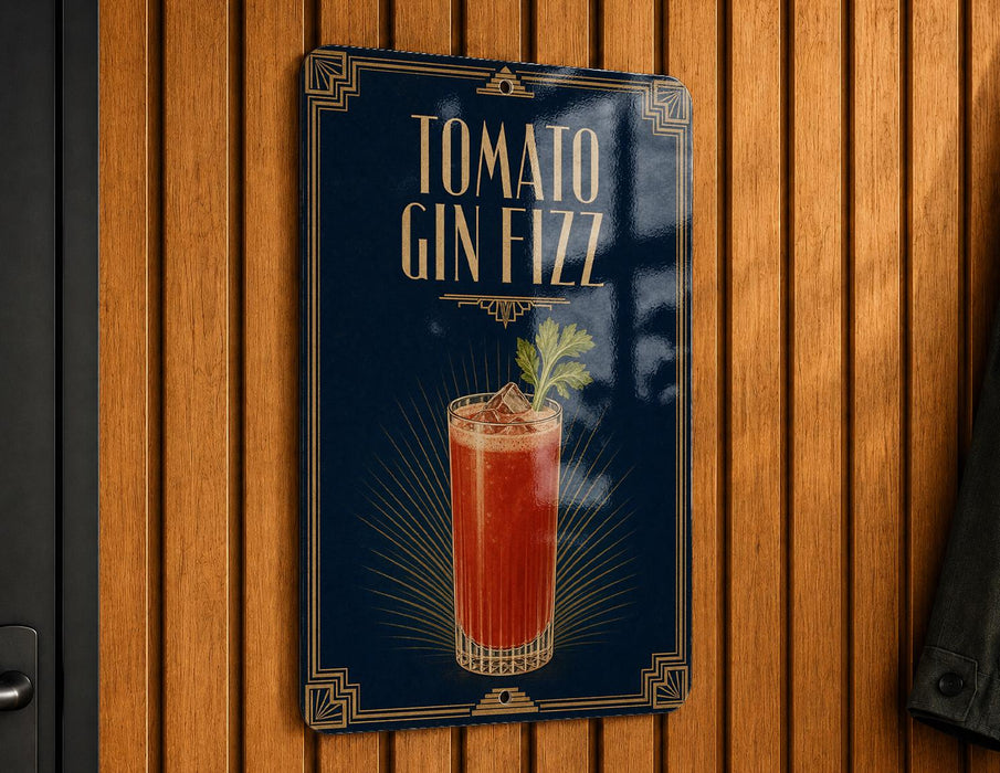 A sign for a cocktail called "Tomato Gin Fizz" is displayed on a wooden wall.